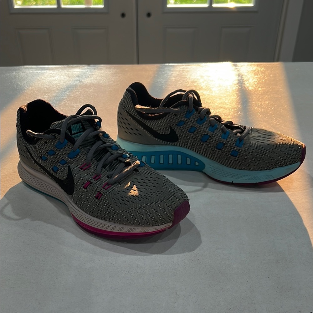 Nike Gray and Blue Athletic Shoes with Modern Design